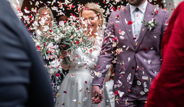 confetti over newlyweds